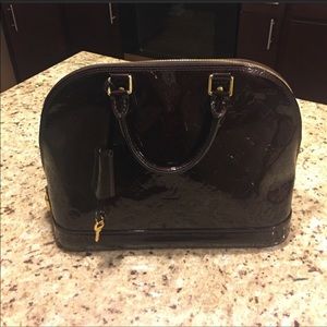 Authentic Burgundy Louis Vuitton alma bag